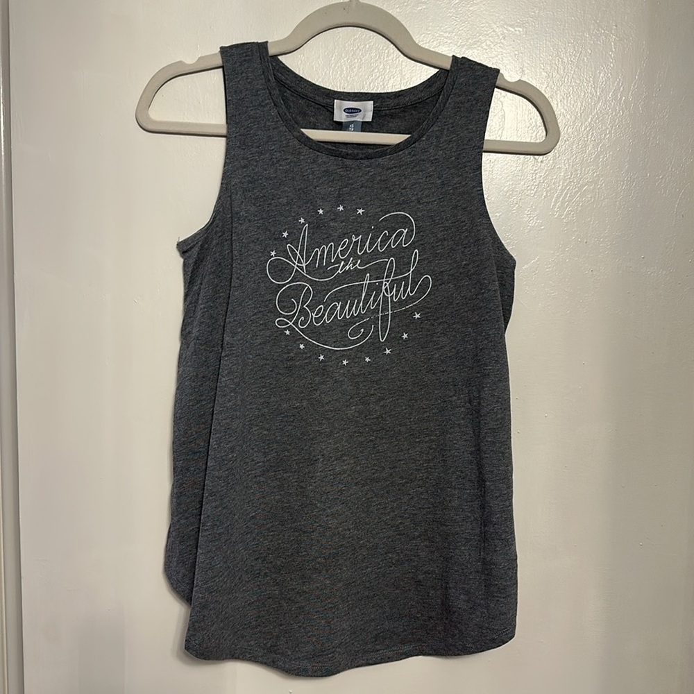 Never worn! Very soft fabric! Womens Tank top.